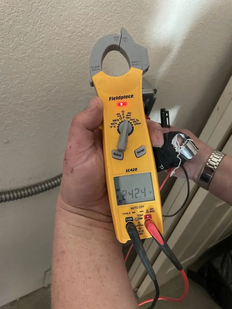Voltage testing with clamp meter during Aluminum Wiring Replacement in Geneseo